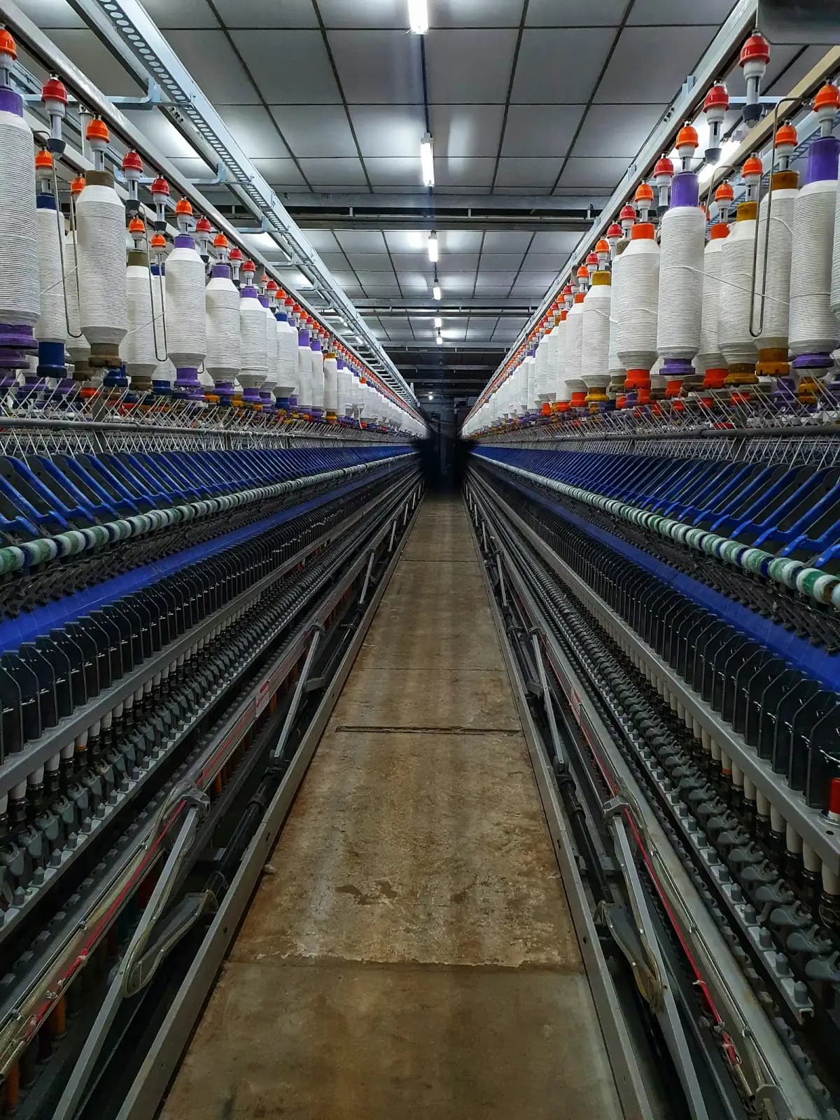 Fabric roll being inspected with AI vision system